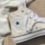 Tênis Converse Chuck Taylor All Star Embroidered Stars Amendoa Amarelo Nude Hi CT32710003 Tênis Converse Chuck Taylor All Star Embroidered Stars Amendoa Amarelo Nude Hi CT32710003